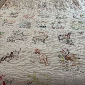Charming Embroidered Animal Quilt in Cream
